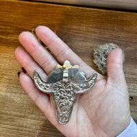 Big Antler longhorn with turquoise pendant with color flowers