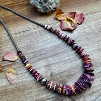 22 Inch graduated deep purple spiny and sterling silver pearls