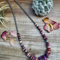 22 Inch graduated deep purple spiny and sterling silver pearls