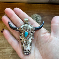 Big Antler longhorn with turquoise pendant II