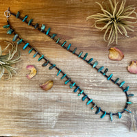 30 inch long shell and turquoise necklace