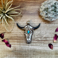 Big Antler longhorn with  turquoise pendant II