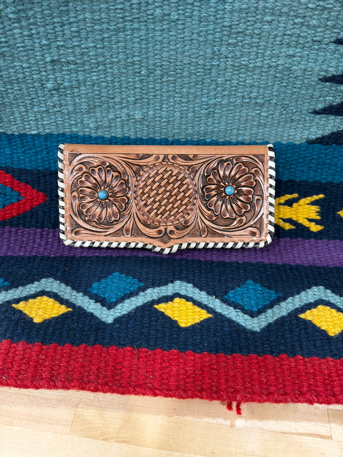 Tooled wallet with buckstitch