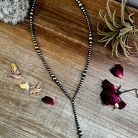 Lariat graduated sterling silver pearl