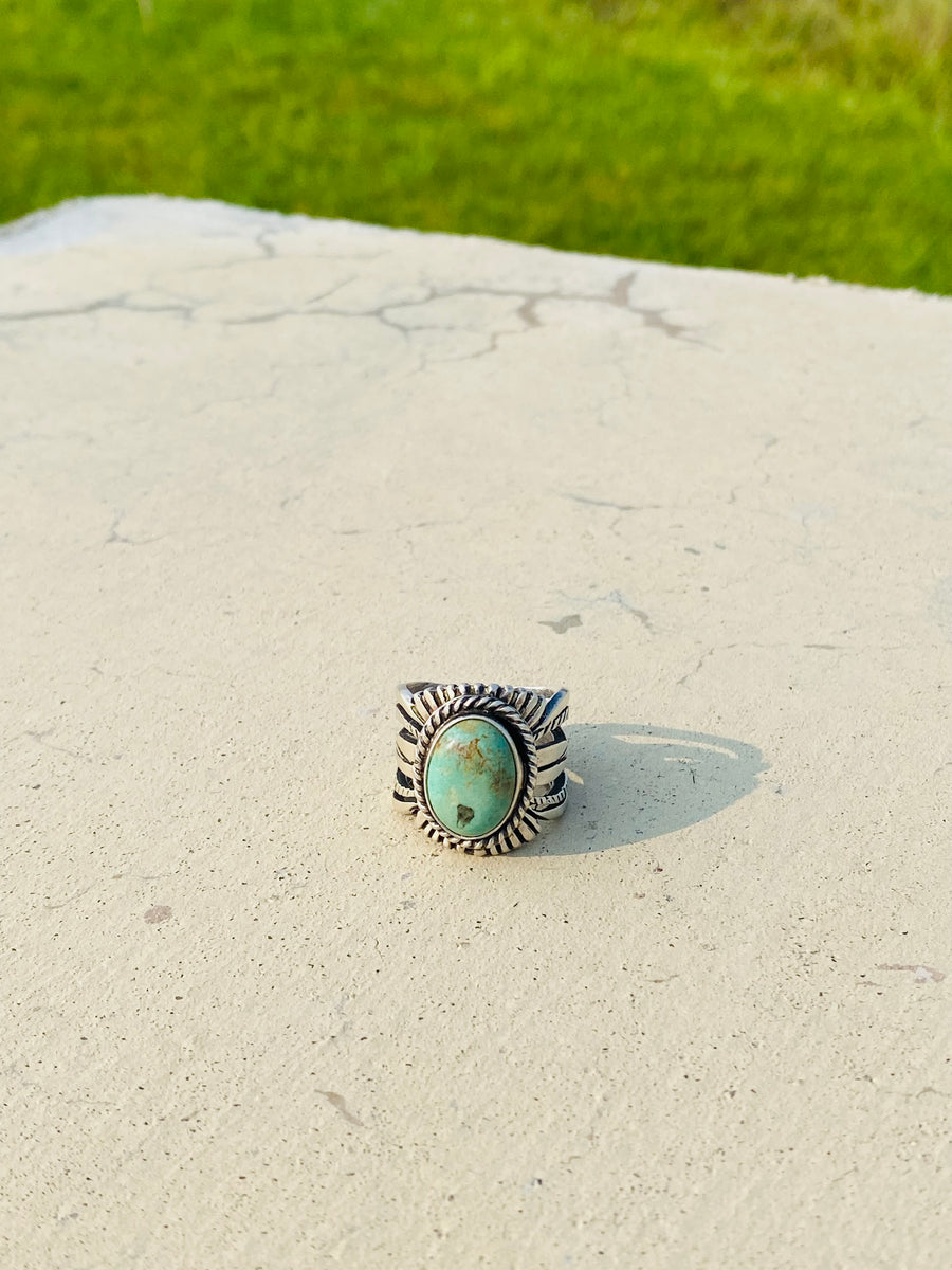 Russell Sam Sterling Silver Ring with Turquoise Stone