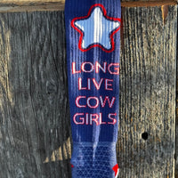 Sock with star design and text 'Long Live Cow Girls' on a wooden background