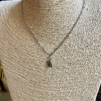 Shell pendant on paper clip chain choker